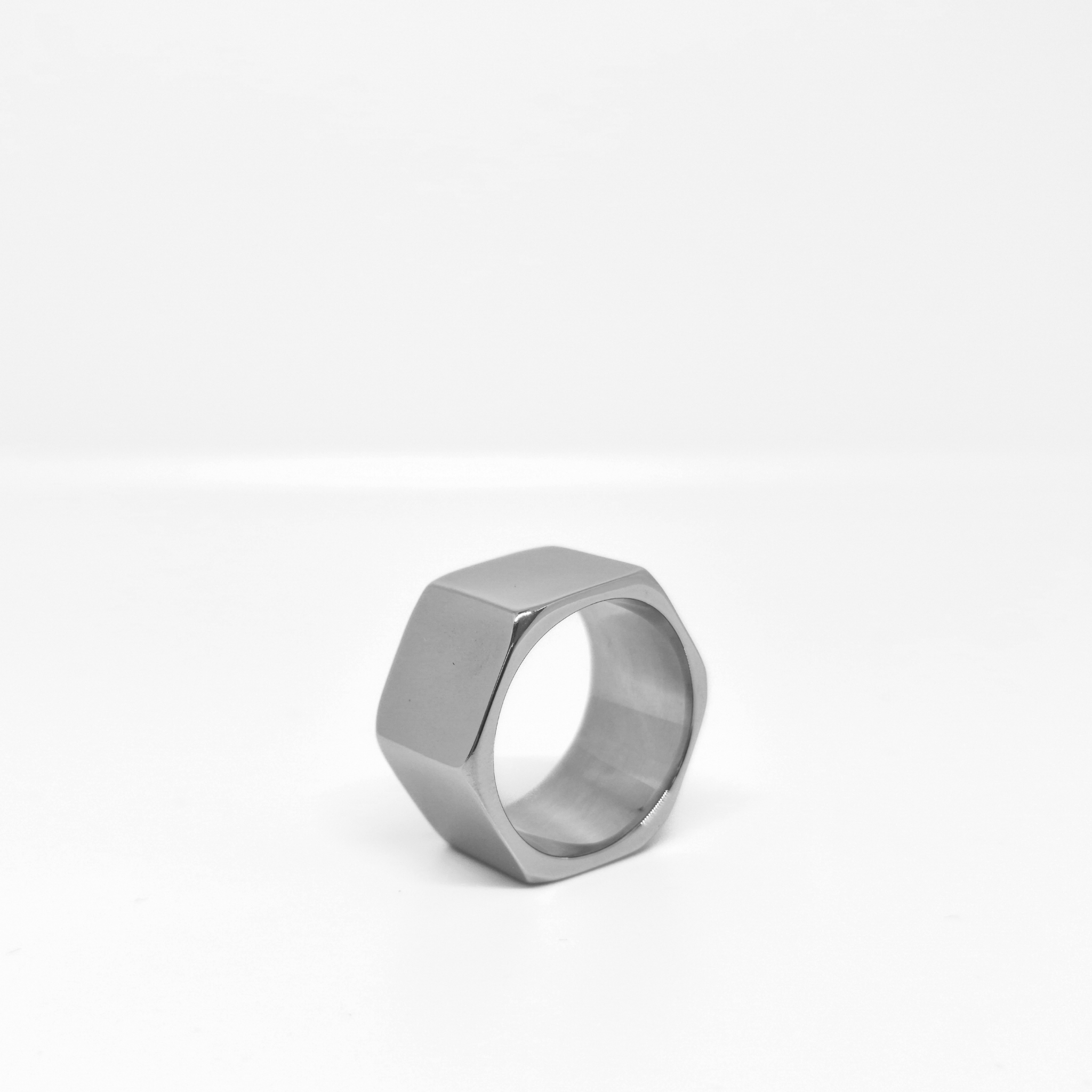 Hexagon-inspired stainless steel ring with a smooth finish