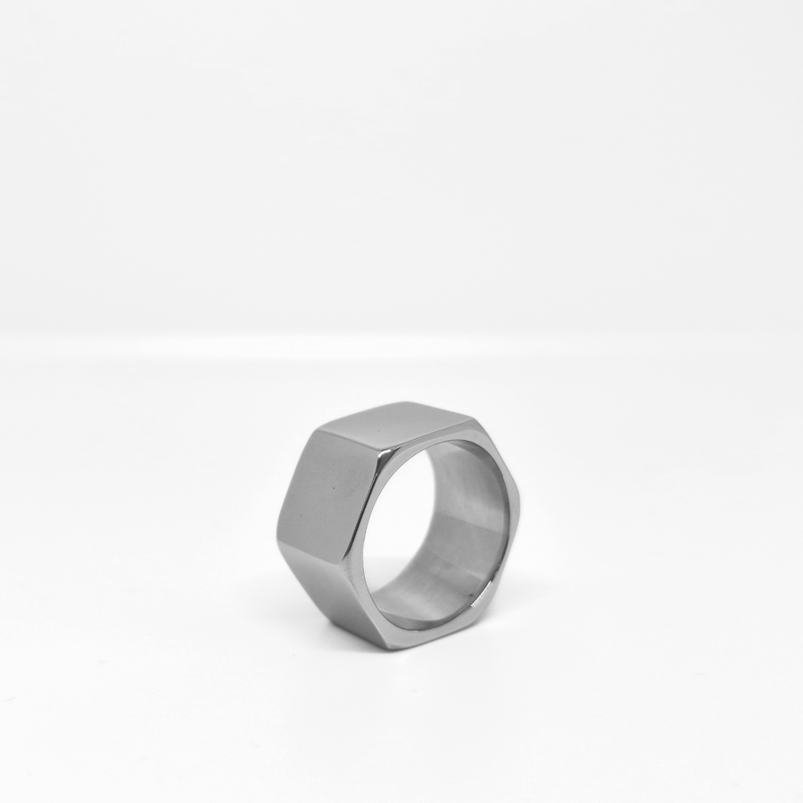 Hexagon-inspired stainless steel ring with a smooth finish